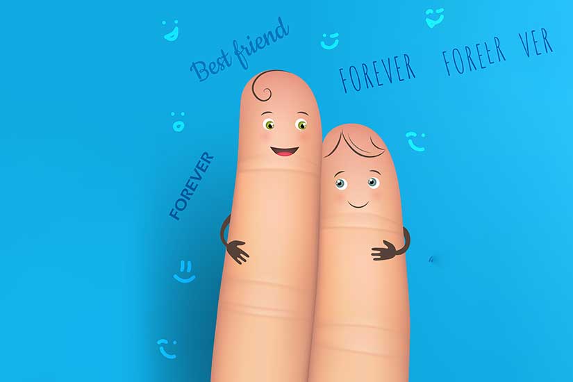 Two fingers forming a V-shape with the words 